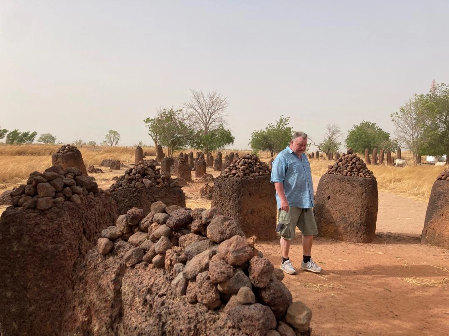 Gambia​ View Tours - Tourism services - A person walking in Janjangbureh
